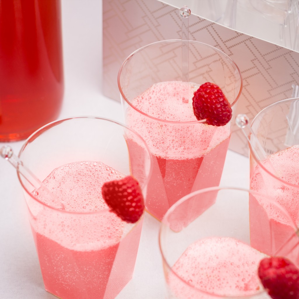 Stir up these pretty pink mimosas for your guests with our Luxe Cups with Swizzle Sticks #valentinesday #mimosas #tableluxe